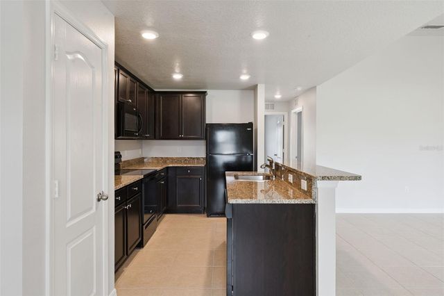 1665 LUFT LANE, Mascotte, FL 34753