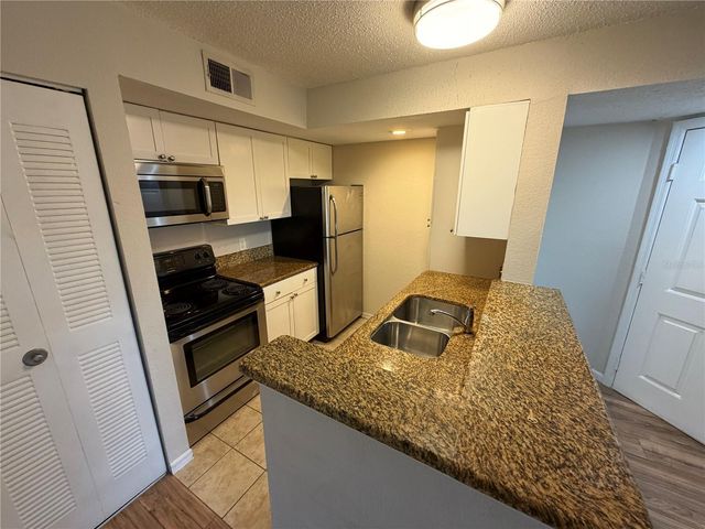 5128 CONROY ROAD 725, Orlando, FL 32811