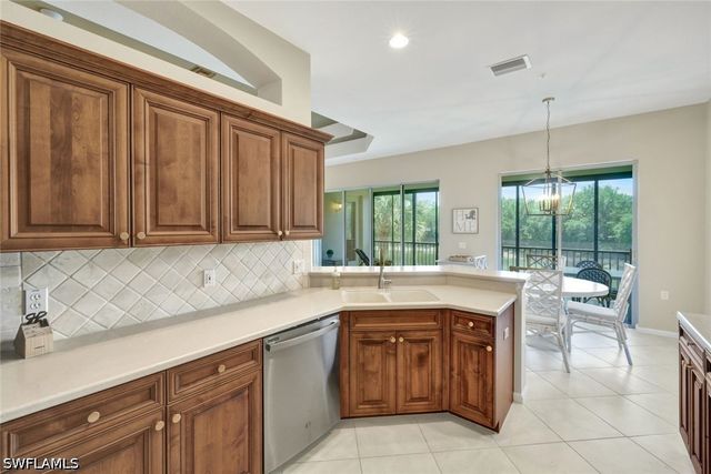 10060 Valiant CT 202, Miromar Lakes, FL 33913