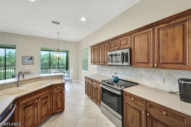 10060 Valiant CT 202, Miromar Lakes, FL 33913