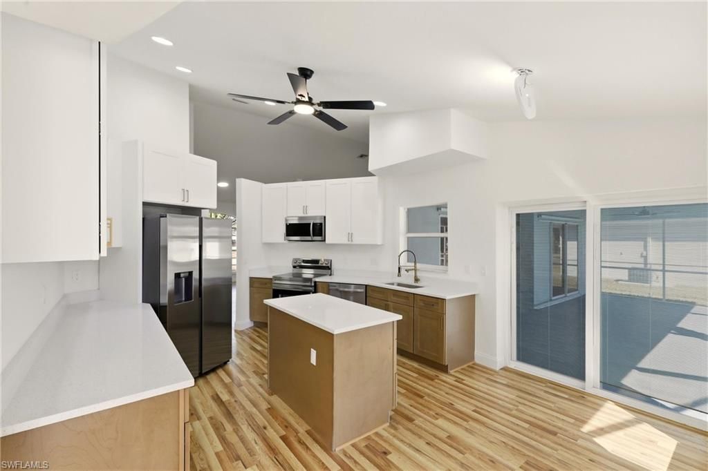 Image 13 of property listing at 410 SE 7th ST, Cape Coral, FL 33990