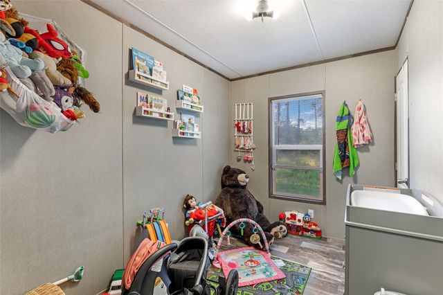 1027 County Road 3141 E, Cleveland, TX 77327