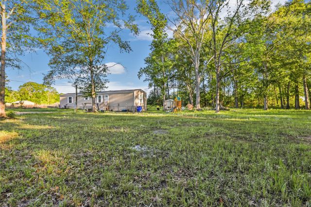 1027 County Road 3141 E, Cleveland, TX 77327