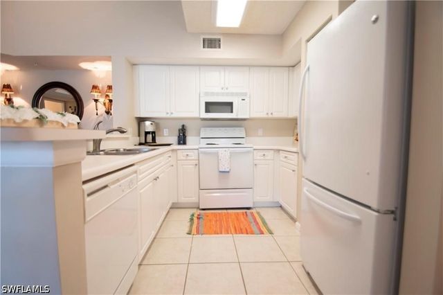 1220 Wildwood Lakes BLVD 201, Naples, FL 34104