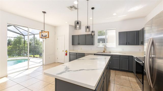 2895 BLOOMING ALAMANDA LOOP, Kissimmee, FL 34747