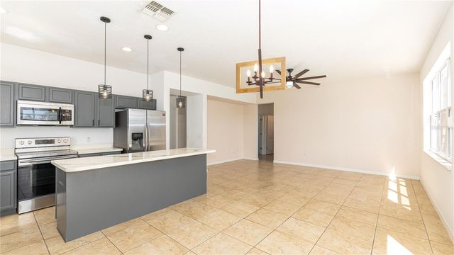 2895 BLOOMING ALAMANDA LOOP, Kissimmee, FL 34747