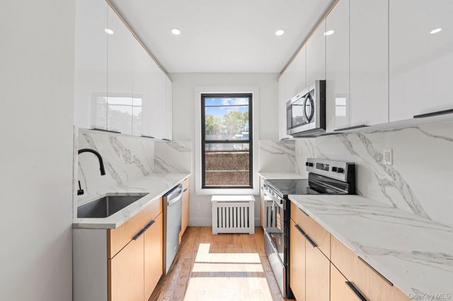 9016 102nd Street, Richmond Hill, NY 11418