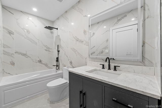 9016 102nd Street, Richmond Hill, NY 11418