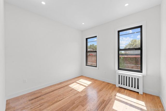 9016 102nd Street, Richmond Hill, NY 11418