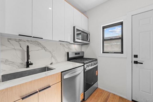 9016 102nd Street, Richmond Hill, NY 11418