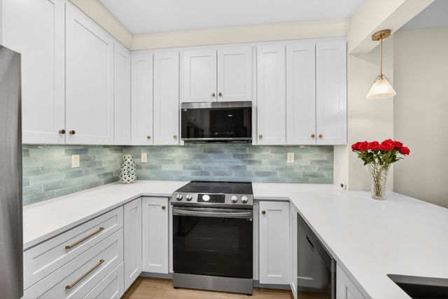 400 Uno Lago Drive 103, Juno Beach, FL 33408