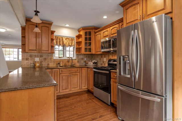 22 Fairview Road W, Massapequa, NY 11758