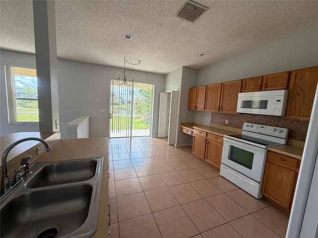 2290 THE OAKS BOULEVARD, Kissimmee, FL 34746
