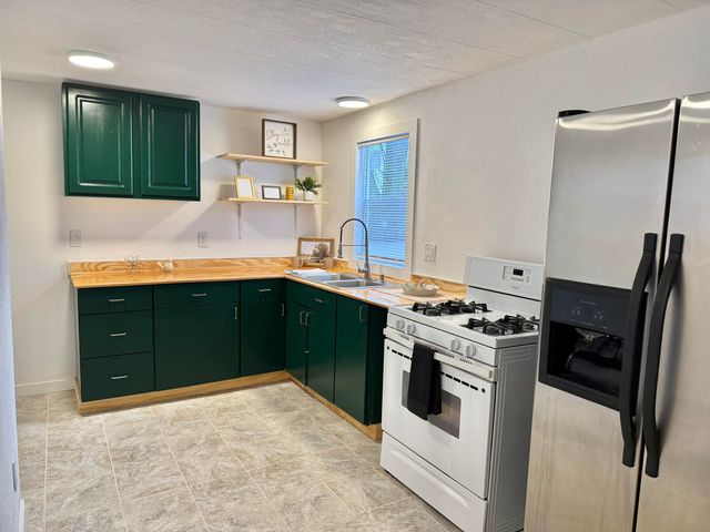 604 W John Beers Road 2L, Lincoln Twp, MI 49127