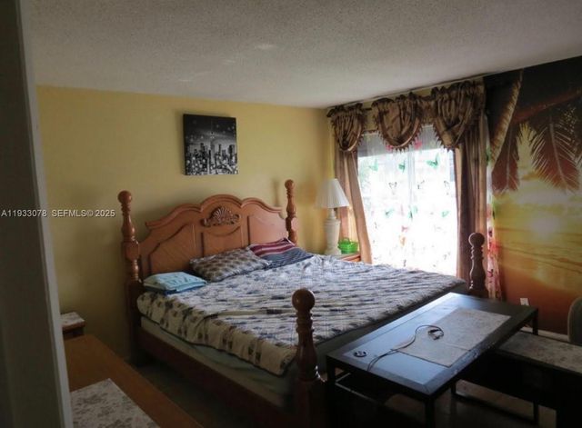 12027 S Greenway Cir 206, Royal Palm Beach, FL 33411