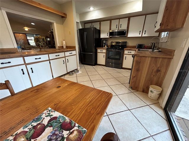 906 VILLAGE GREEN ROAD, Deland, FL 32720