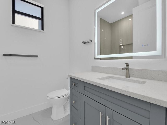 1033 Bassinger AVE S, Lehigh Acres, FL 33974