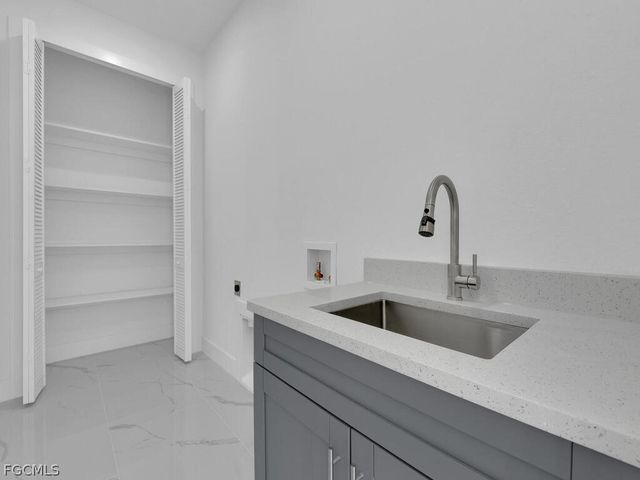 1033 Bassinger AVE S, Lehigh Acres, FL 33974