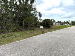 1009 JACKSON AVENUE, Lehigh Acres, FL 33972