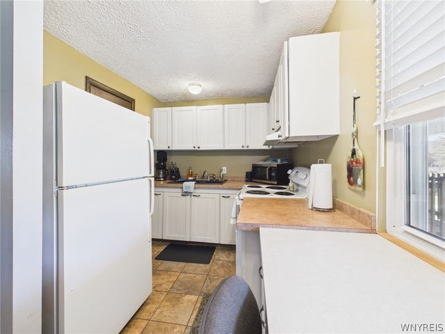 26 Pine Tree Village Road, Ellicottville, NY 14731