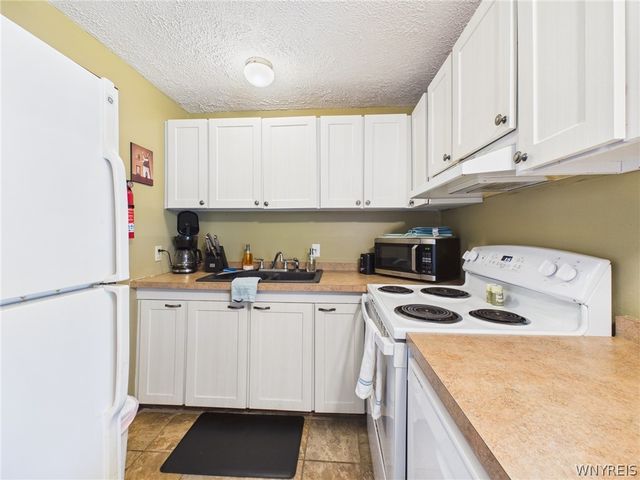 26 Pine Tree Village Road, Ellicottville, NY 14731