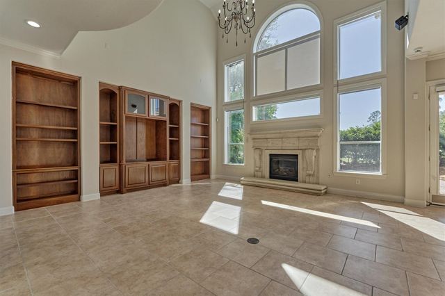 23 Player Oaks Place, The Woodlands, TX 77382