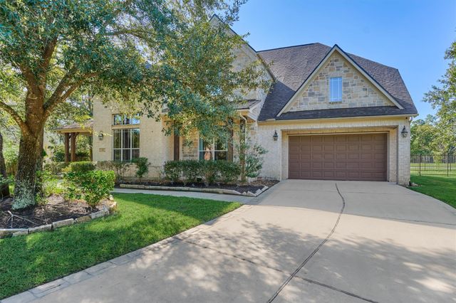 23 Player Oaks Place, The Woodlands, TX 77382