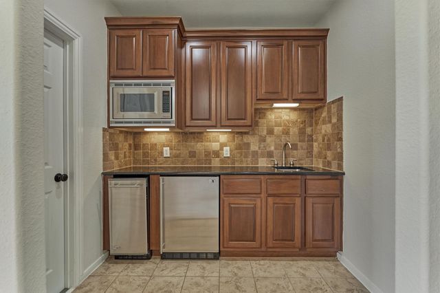 23 Player Oaks Place, The Woodlands, TX 77382