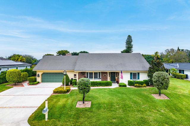 420 Muirfield Drive, Atlantis, FL 33462