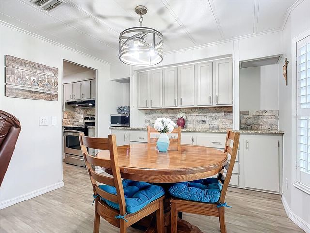 812 SWALLOW LANE M142, Osteen, FL 32764