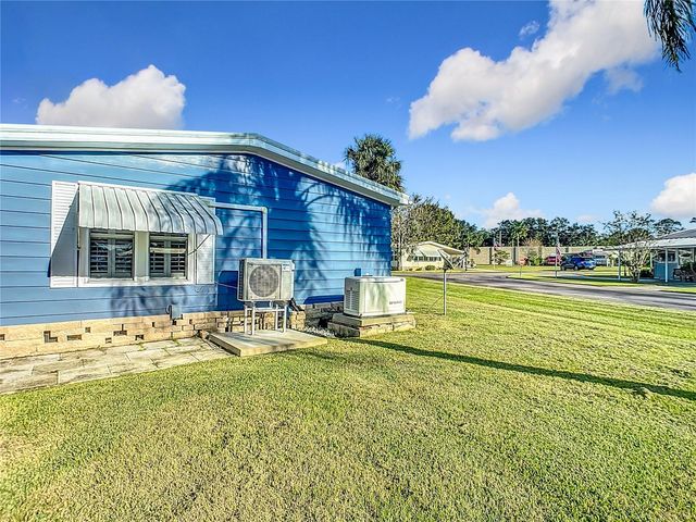 812 SWALLOW LANE M142, Osteen, FL 32764