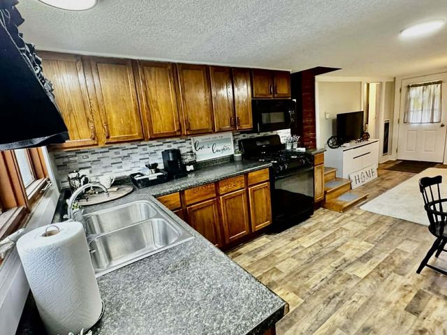 6240 Terry Drive, Six Lakes, MI 48886