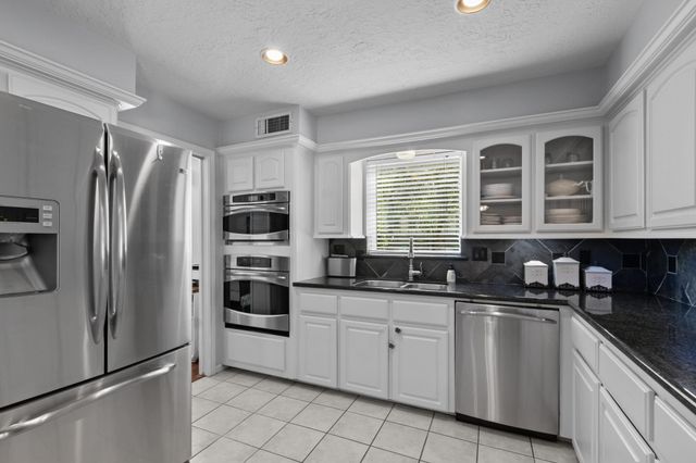 3414 Flickering Candle Drive, Spring, TX 77388