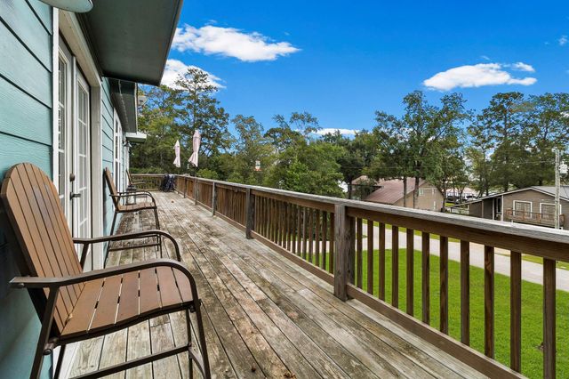 241 Whisperwood Drive, Onalaska, TX 77360