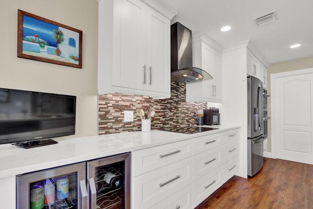 133 Farmingdale Drive, Jupiter, FL 33458