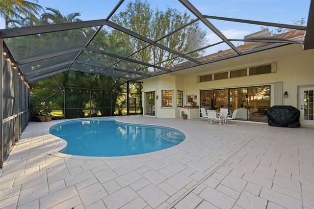 7720 W Upper Ridge Drive, Parkland, FL 33067