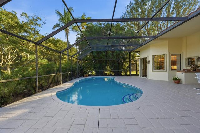 7720 W Upper Ridge Drive, Parkland, FL 33067