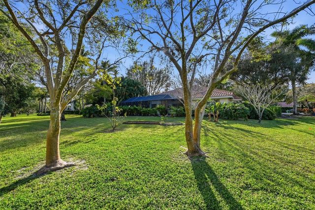 7720 W Upper Ridge Drive, Parkland, FL 33067