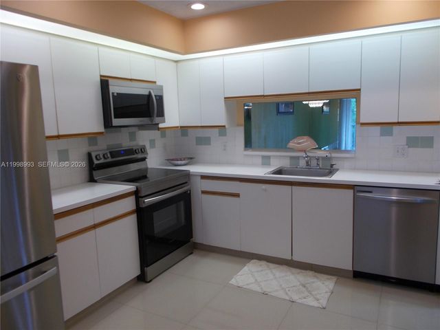 13001 SW 15th Ct 408T, Pembroke Pines, FL 33027