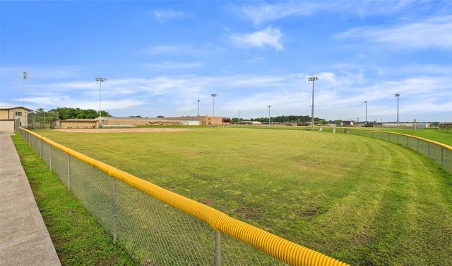 1091 Tarkington Timbers Drive, Cleveland, TX 77327