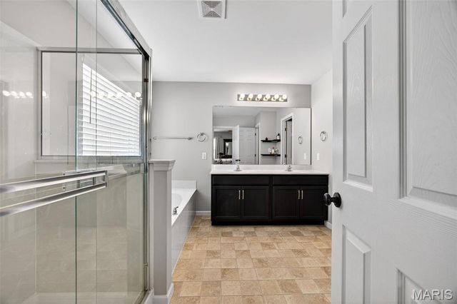 303 Hidden Bluffs Court, Lake St Louis, MO 63367