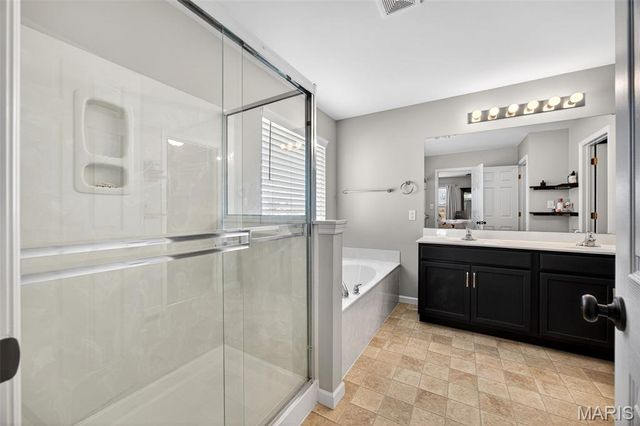 303 Hidden Bluffs Court, Lake St Louis, MO 63367