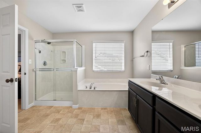 303 Hidden Bluffs Court, Lake St Louis, MO 63367