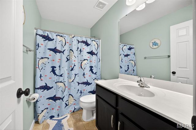 303 Hidden Bluffs Court, Lake St Louis, MO 63367