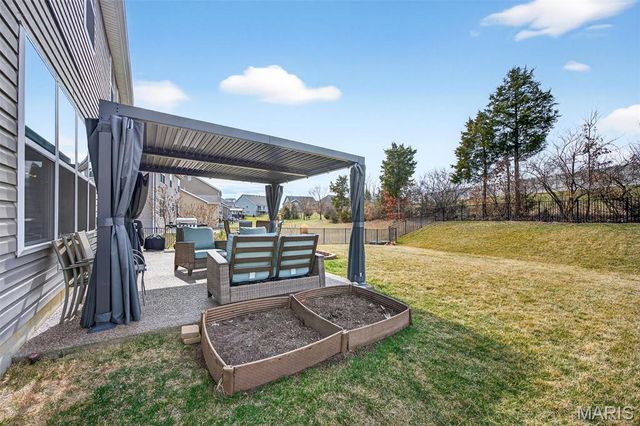 303 Hidden Bluffs Court, Lake St Louis, MO 63367