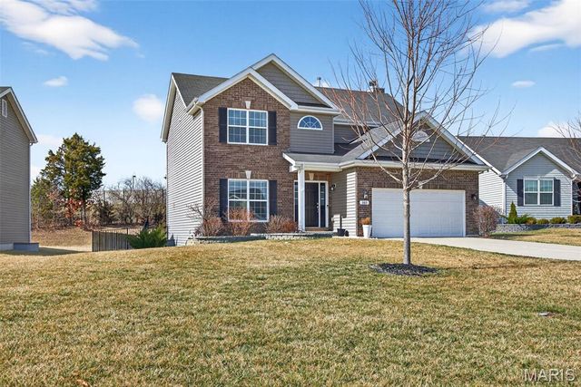 303 Hidden Bluffs Court, Lake St Louis, MO 63367