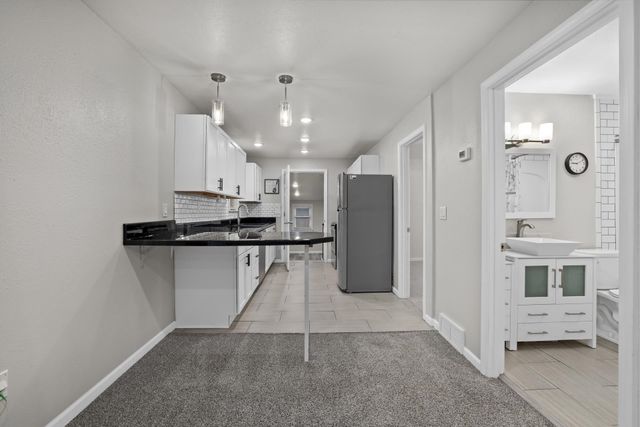 908 7TH AVE NW, Minot, ND 58703