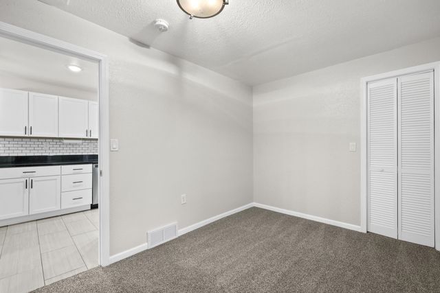 908 7TH AVE NW, Minot, ND 58703