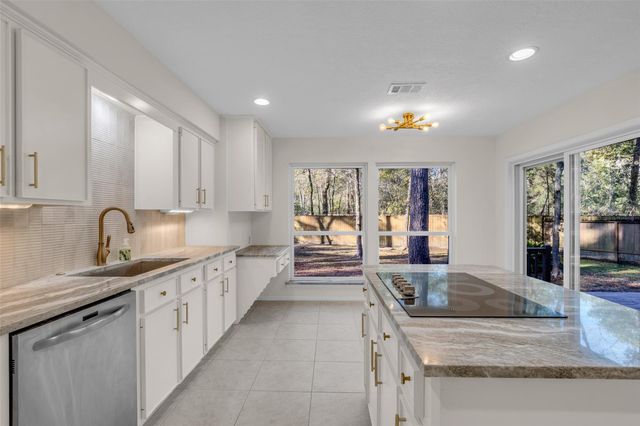 11407 Timberwild Street, The Woodlands, TX 77380