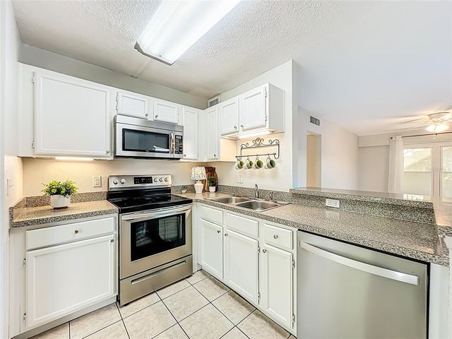 1100 DELANEY AVENUE E15, Orlando, FL 32806